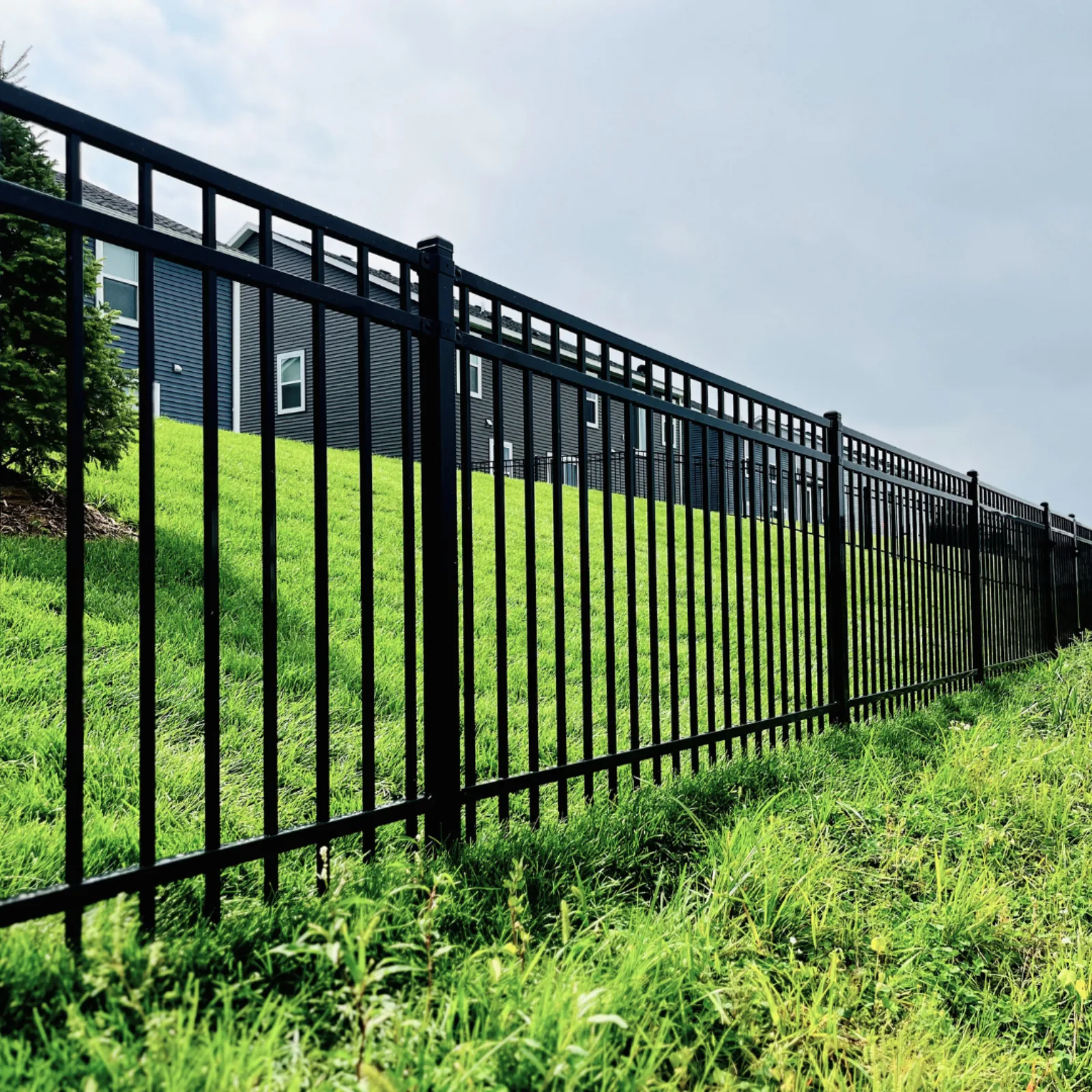 Black ornamental steel fence installed in the Minneapolis metro